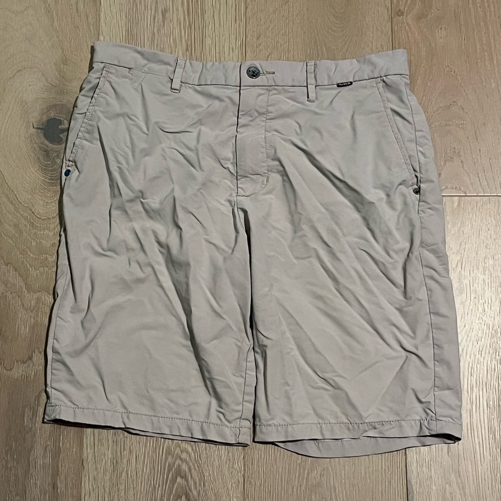 Faded white Hurley swimsuit or athletic shorts